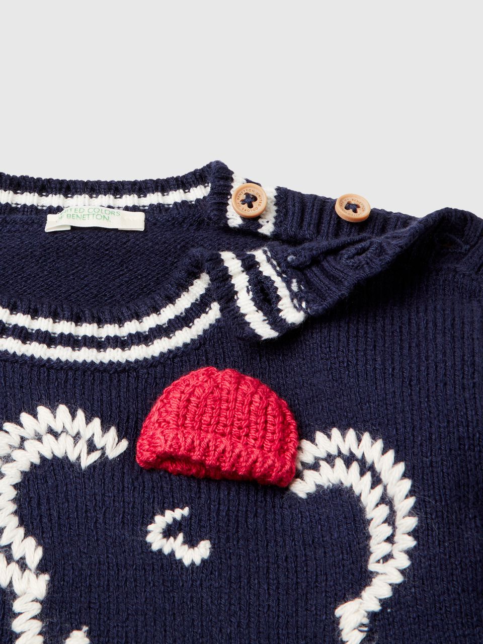 SWEATER WITH EMBROIDERY AND APPLIQUE