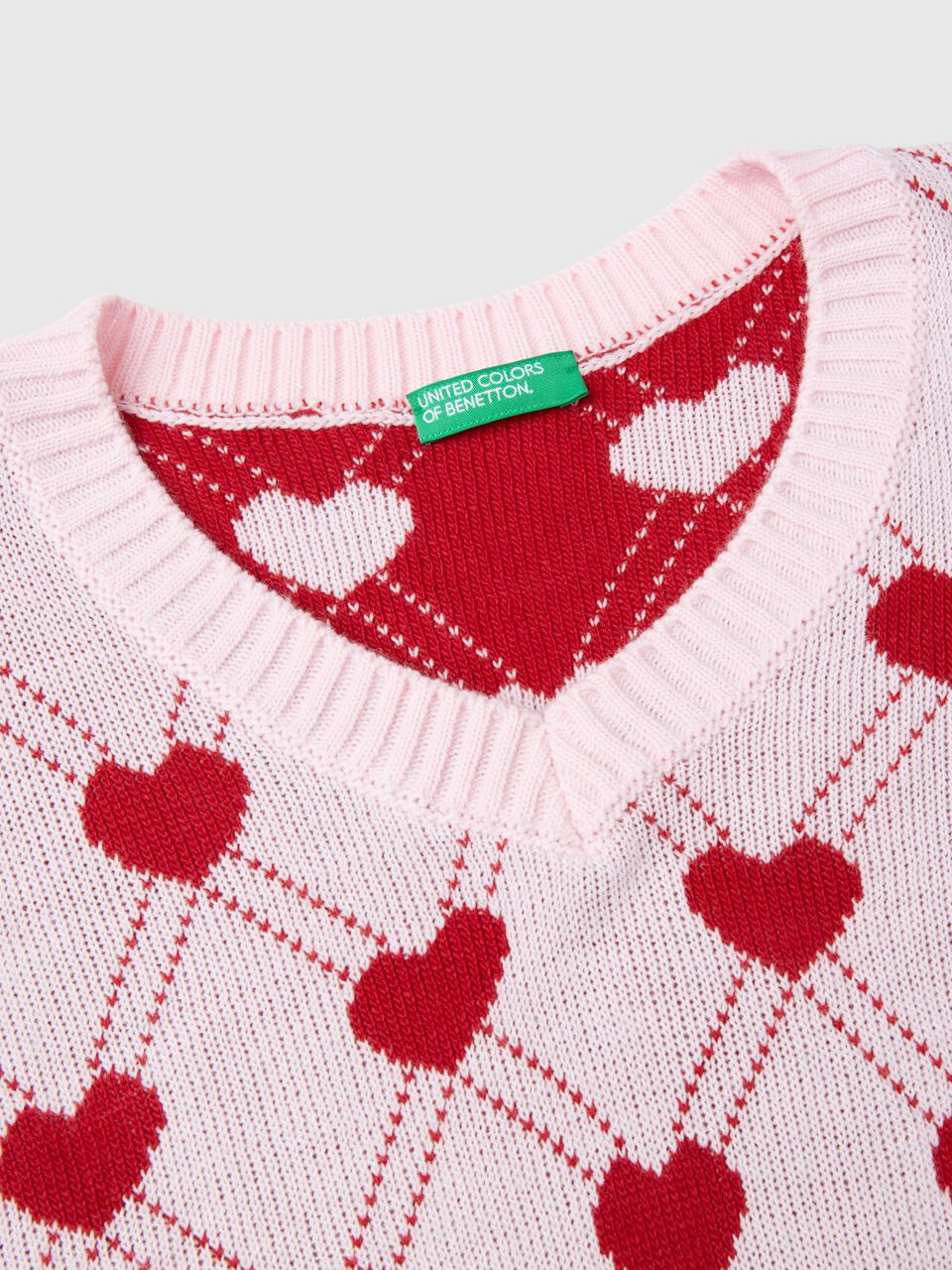 CROPPED VEST WITH HEART MOTIF