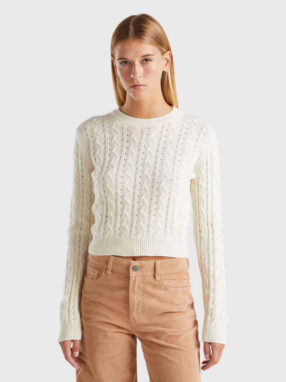 CROPPED SWEATER WITH CABLE KNIT AND PERFORATIONS