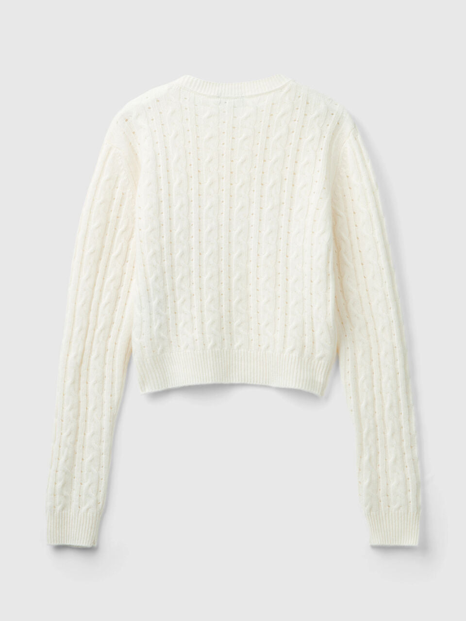 CROPPED SWEATER WITH CABLE KNIT AND PERFORATIONS