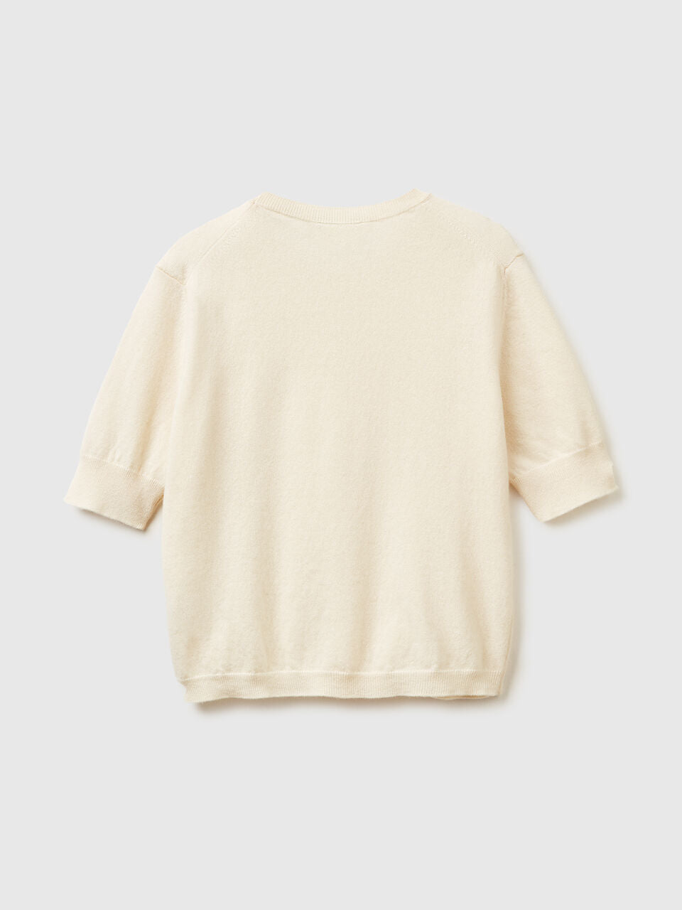 SHORT-SLEEVED SWEATER IN PURE MERINO WOOL