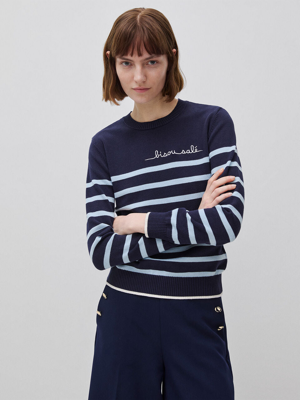 STRIPED SWEATER WITH EMBROIDERED WRITING