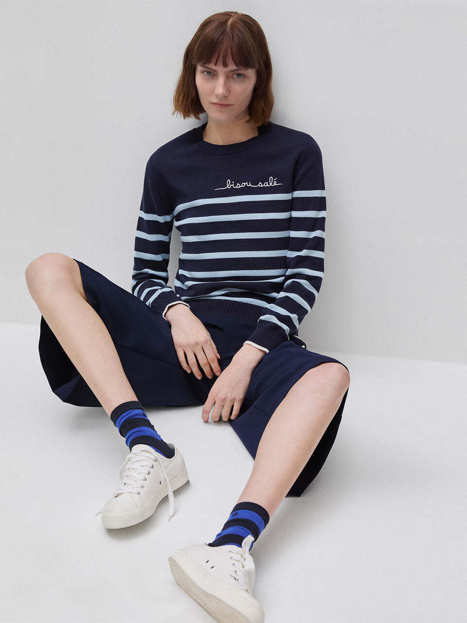 STRIPED SWEATER WITH EMBROIDERED WRITING