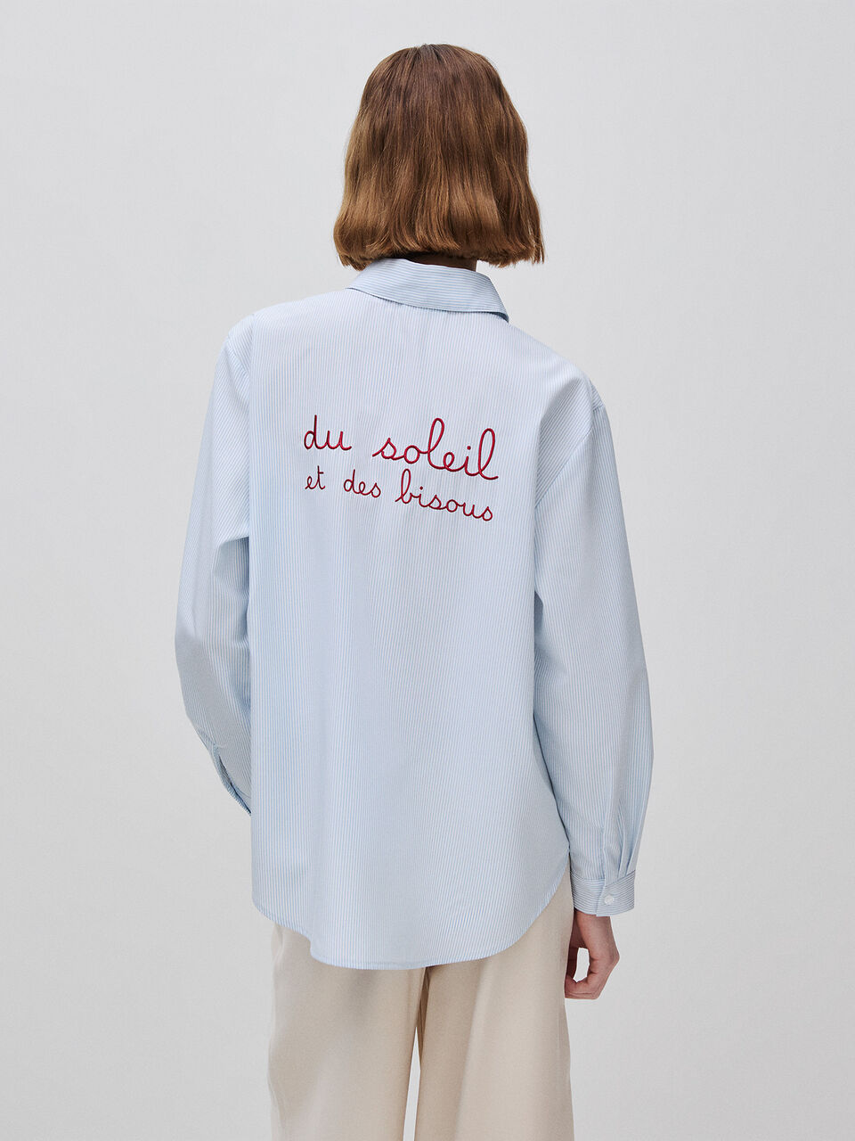 STRIPED SHIRT WITH EMBROIDERY ON THE BACK