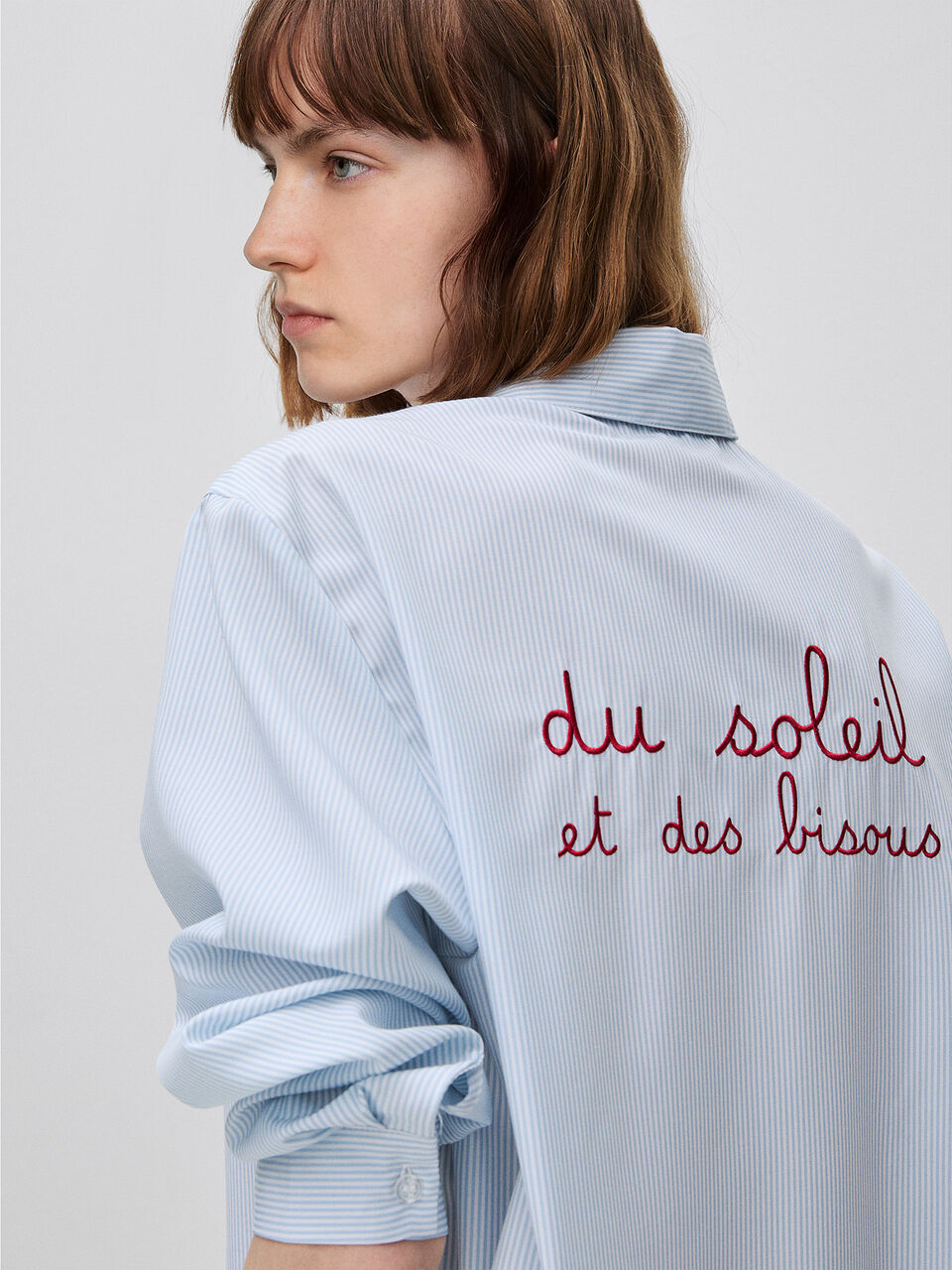 STRIPED SHIRT WITH EMBROIDERY ON THE BACK
