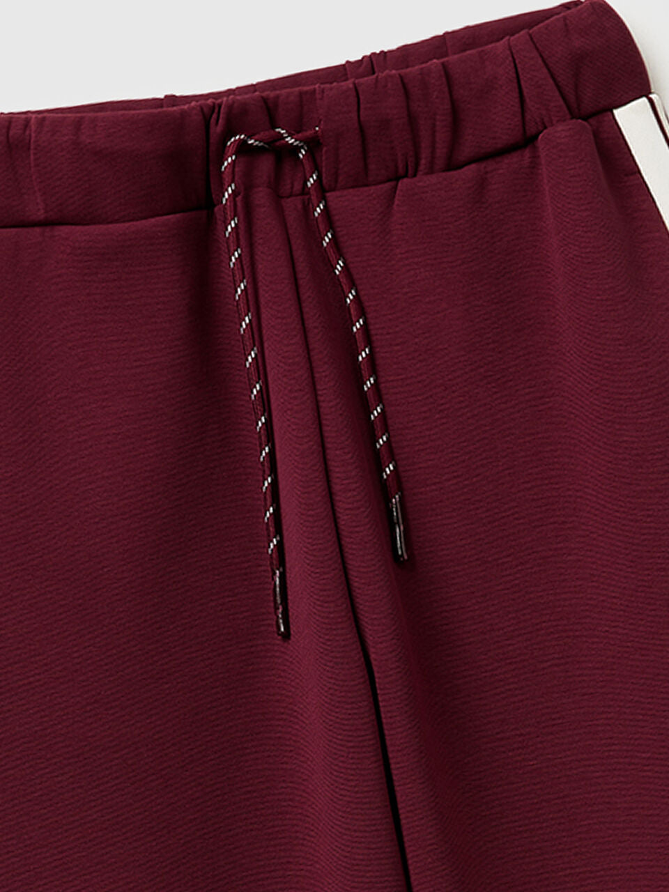 TROUSERS WITH STRIPED SIDE BANDS